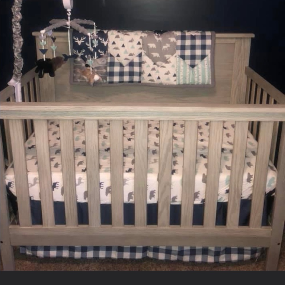 6 pieces- like new woodland trail crib set